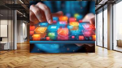 Person Using Tablet With Colorful App Icons Wall mural