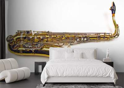 Old golden saxophone on white background.
Beautiful vintage shiny brass jazz musical instrument. Wall mural