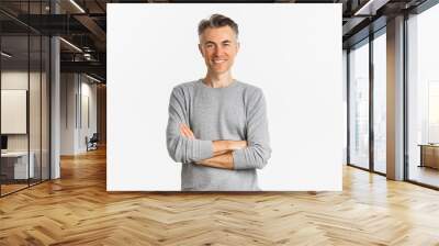 Image of successful and confident middle-aged man, cross arms on chest and smiling satisfied, standing determined over white background Wall mural