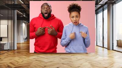 why us. shocked disturbed complaining two african american brother sister pointing chest index finge Wall mural