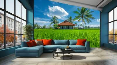 A hut with a thatched roof and two palm trees Wall mural