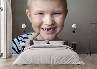 Boy missing milk teeth Wall mural