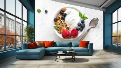 Granola with yogurt and berries Wall mural