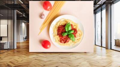 Spaghetti pasta on pink background Wall mural