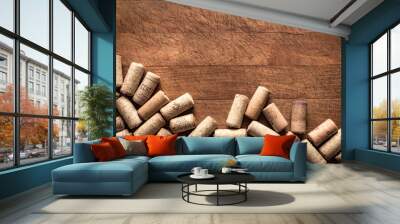 Wine corks on wooden table Wall mural