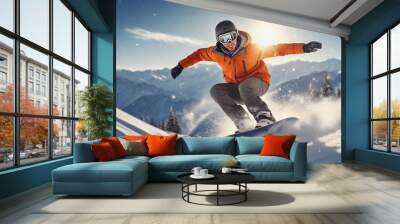 Young man snowboarding in the mountains Wall mural