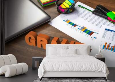 Business accessories, smartphone calculator, laptop, reports and diary with 3D text Grant Wall mural