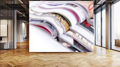 Stack of magazines isolated on white background Wall mural