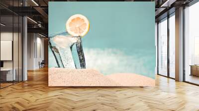 cold drink on the beach on a hot summer day Wall mural