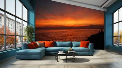 red vivid sunset by the sea Wall mural