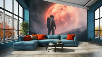 Man in Space Suit Standing on Mountain Wall mural