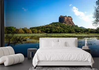 Panoramic picture of Sigiriya Rock Fortress, (a UNESCO world heritage Site) seen from Sigiriya Lake in the cultural triangle of Sri Lanka, Asia Wall mural