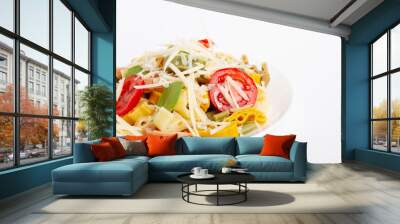 Pasta, macaroni with tomatoes and cheese in a plate on a light background. Wall mural