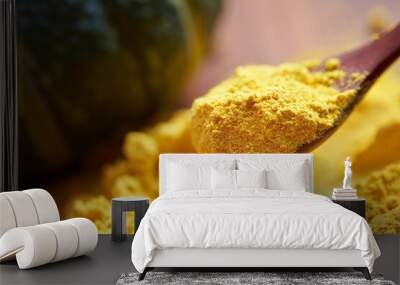 yellow powder on a spoon Wall mural