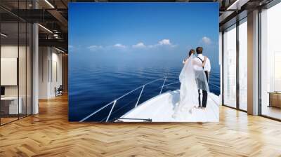 happy bride and groom on a yacht Wall mural