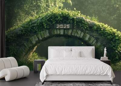 A weathered bridge covered in grass and plants Wall mural