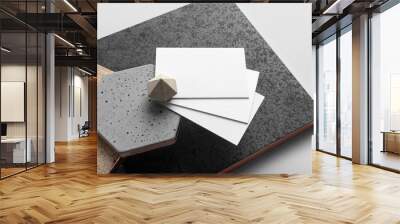 Real photo, business cards branding mockup template to place your design, isolated on light grey background, with concrete, copper, granite and floral elements. Wall mural