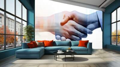 Two strangers come together in a moment of connection, their hands shaking as their fingers entwine in a warm embrace Wall mural