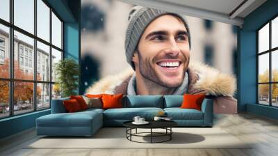 A city winter portrait of a cheerful and attractive male student dressed in warm attire, beaming with joy amidst the autumn foliage, generative ai art Wall mural