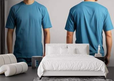 A man wears a plain blue t-shirt, front and back, for a t-shirt design mock up, Ai Generated Images Wall mural