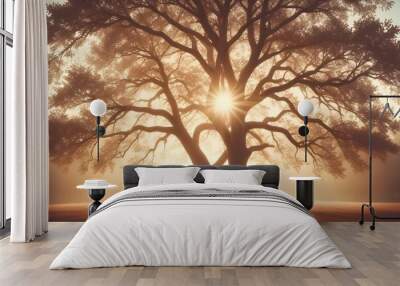 A photograph of two trees in a foggy forest. The trees are silhouetted against the golden light of the sunrise, creating a sense of tranquility and mystery. Wall mural