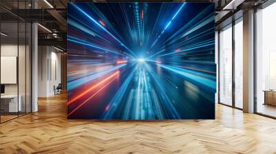 Abstract image of a city at night, with streaks of light representing speed and movement. The background is a blur of colors and shapes. Wall mural