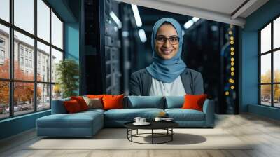 Hijabi Data engineer smiling at the camera in server room, Women empowerment in Big Data Cloud Computing Architecture and Data Science Wall mural