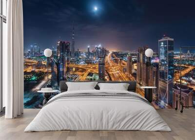 Dubai Downtown Towers With Shiekh Zayed Road in a one beautiful panoramic night view Wall mural