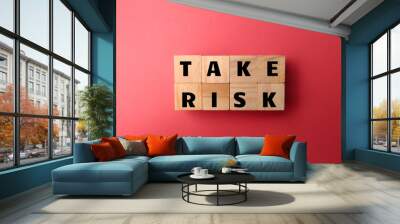 Wooden cube with the word TAKE RISK Wall mural