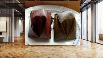 passover cake,  dessert made from glutinous rice wrapped in banana leaf. photo taken in malaysia. southeast asian desert aka kue  kochi Wall mural