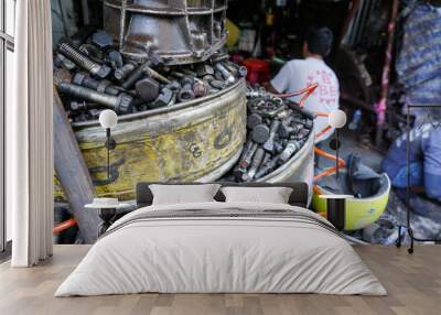 Bangkok, Thailand. Mar 30, 2015. Cleanliness is very important. If you let kids make a total mess in kitchen and then leave, you are not really teaching them anything. Old bolts and nuts at workshop. Wall mural