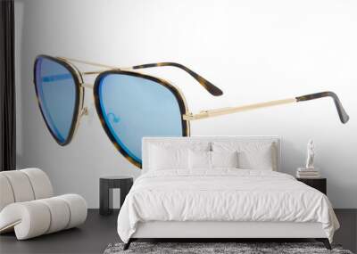 Gold metal frame sunglasses tortoise texture frame blue shades lens men and women glasses front right view Wall mural