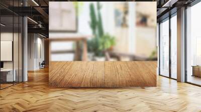 empty wooden table with blur restaurant background Wall mural