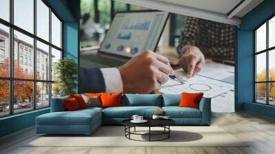 Financial analyst calculating with number documents, Investment concept. Wall mural