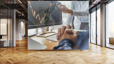 Investment concept, Investor calculating a valuation of stock market exchange. Wall mural