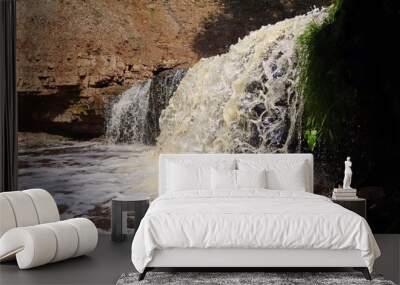 water stream cascade falling on the rocks close up Wall mural