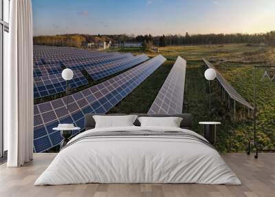 View to solar panels on field at sunny autumn morning from above Wall mural