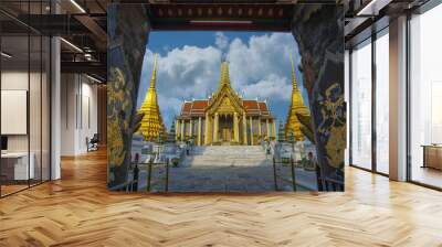 Wat Phra Kaew, Bangkok famous landmark of Thailand. Temple of the Emerald Buddha with blue sky. Landscape of beautiful architecture in Bangkok. Wall mural