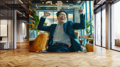 Joyful man dancing at workplace, successful asian businessman in business suit sitting at workplace with laptop inside office, celebrating successful achievement results, smiling, Generative AI Wall mural