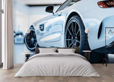 A detailed view of a white car on display in a showroom.  Wall mural