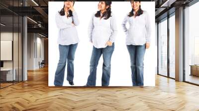 Young pregnant woman standing three full body poses isolated Wall mural