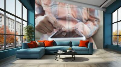 man we are looking for a smart phone at home Wall mural