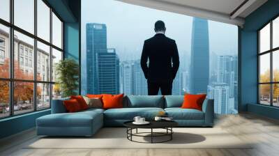 Ambitious Executive Gazing at Urban Skyline, Reflecting on Future Opportunities and Success in a Dynamic Business Environment Wall mural