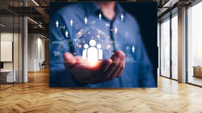 Customer Relationship Management and global business concept, Businessman show global structure customer network technology icon in hand digital marketing and human business development. Wall mural