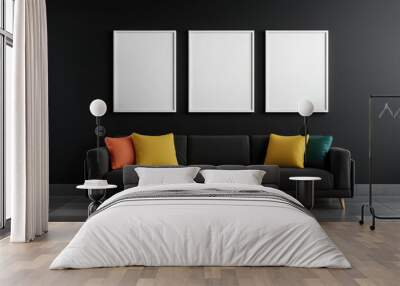 Explore a serene black room featuring a comfortable couch and three white-framed pictures, perfect for creating a tranquil ambiance. Wall mural