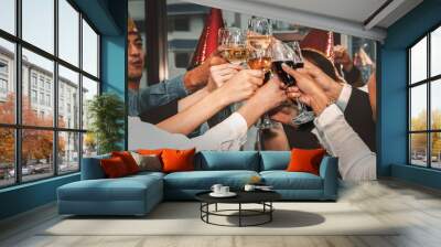 group of business people enjoying party and clinking glass of champagne and wine together to celebrate corporate success and new year event Wall mural