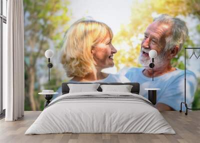 senior couple having a good time in park Wall mural