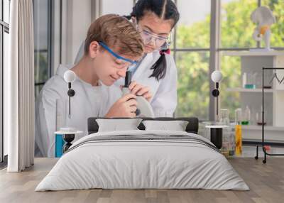 students using microscope in science laboratory class Wall mural