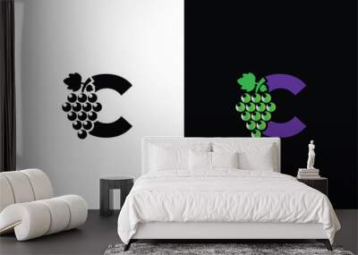 Initial letter C logo. Modern and simple letter C for the Grape symbol logo design with green leaves. Wall mural