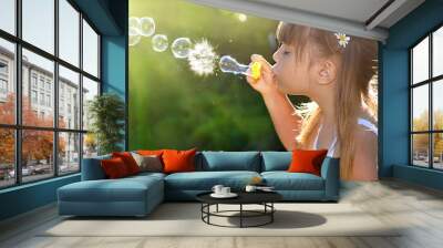 Blowing soap bubbles Wall mural